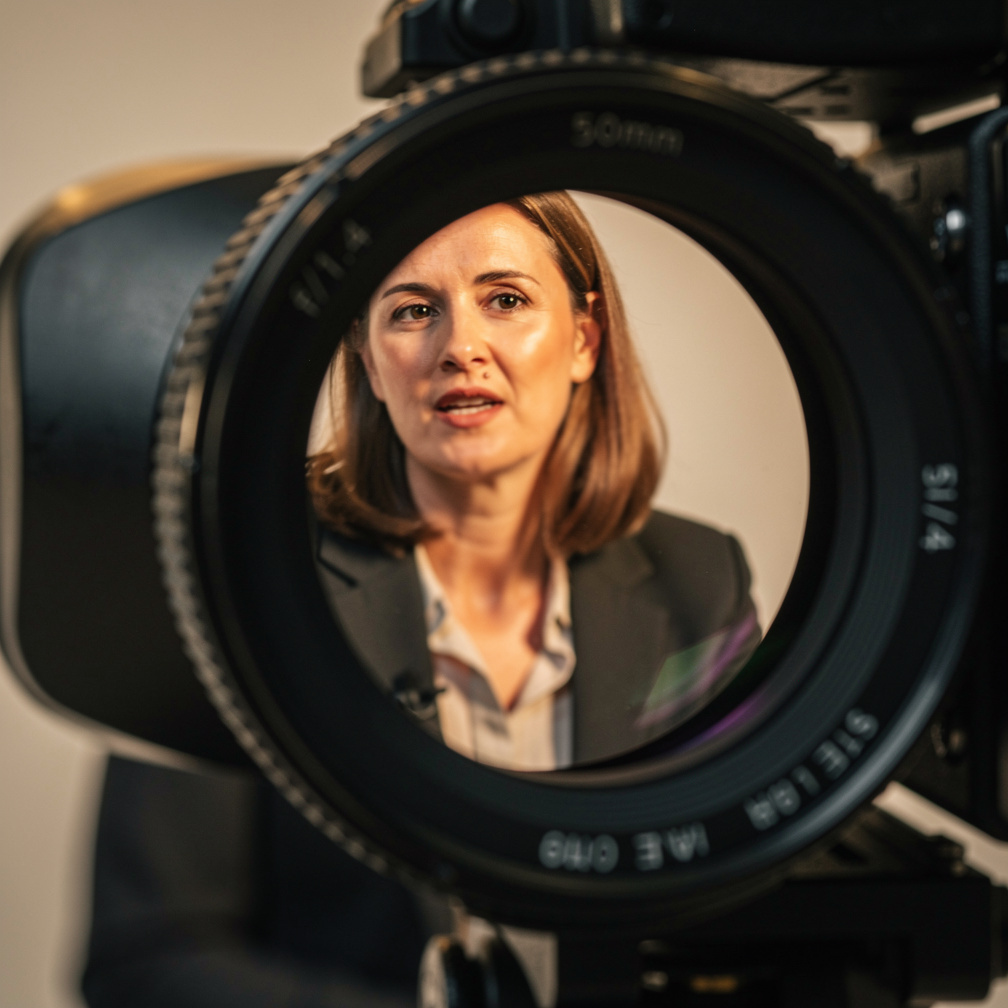 Camera framing a person during an interview recording
